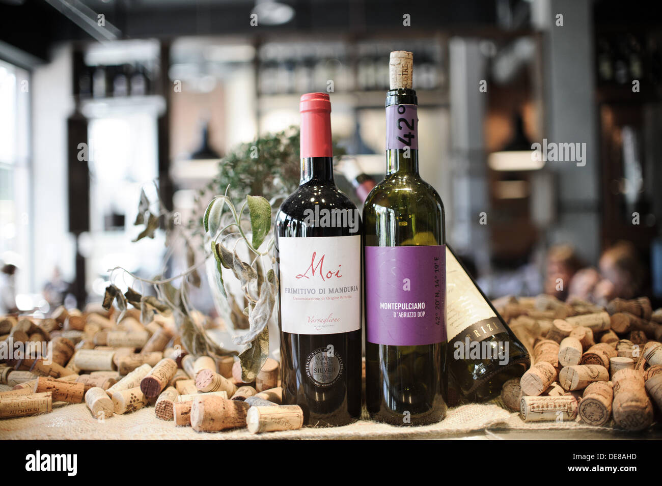 Wine bottles and corks can be seen on 06.09.2013 in Hamburg on a table. Photo picture alliance