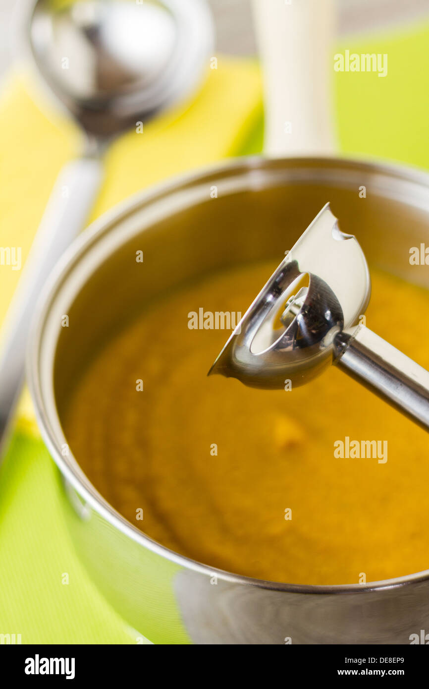 Part of a series showing the preparation of Spiced Carrot and Lentil Soup. Stock Photo