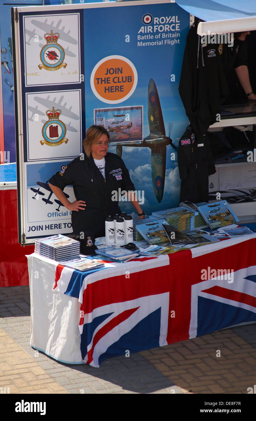 Public Relations Officer manning Royal Air Force stall at Bournemouth Air Festival 2013 at Bournemouth, Dorset UK in August Stock Photo