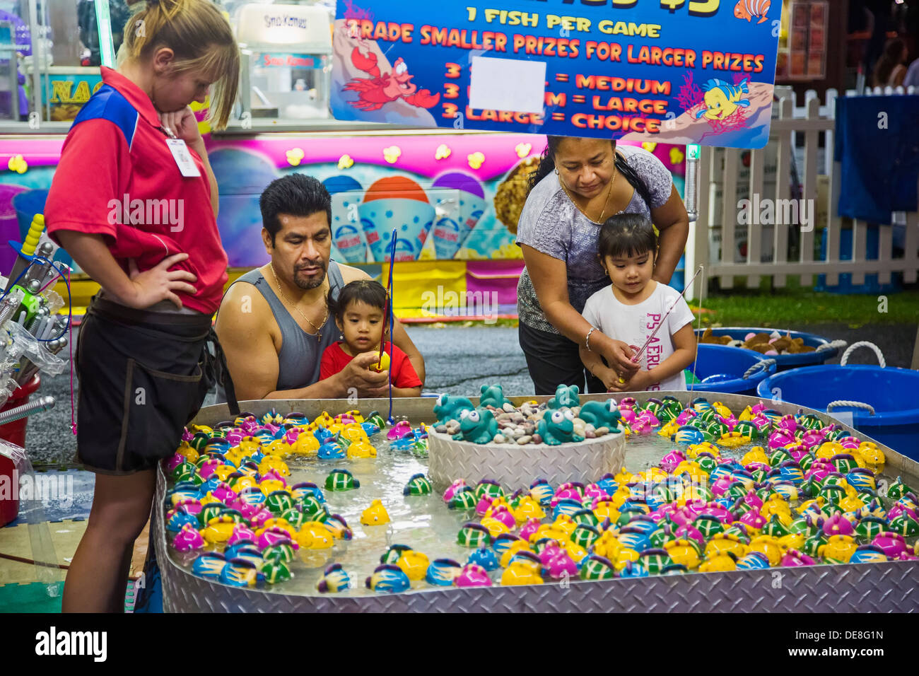 Chatham, New York - Young children fish for ducks in a game at the Columbia County Fair. Stock Photo
