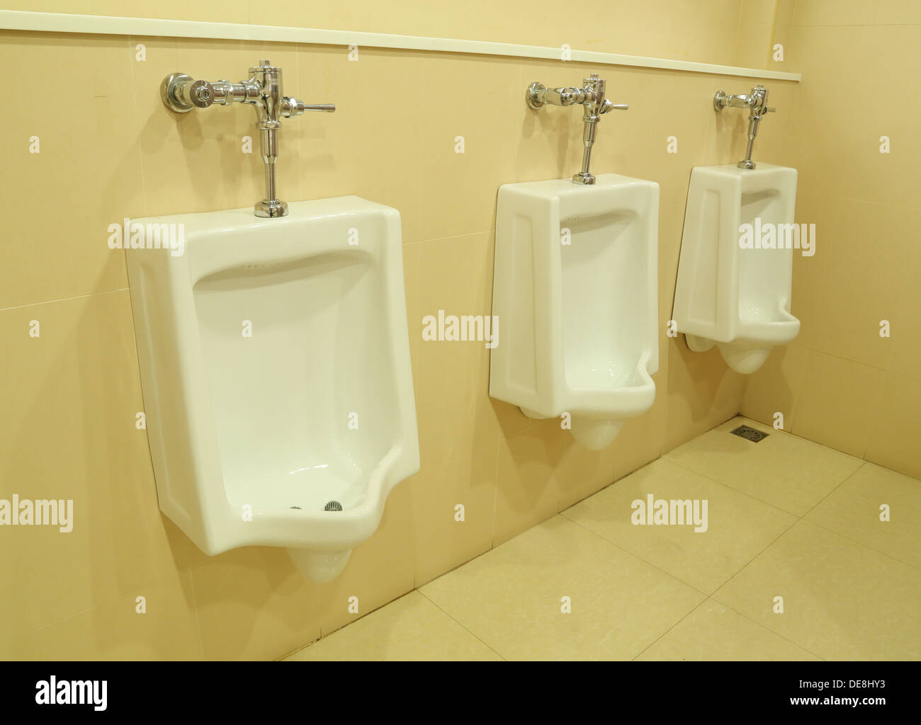 white urinal in the public restroom Stock Photo Alamy