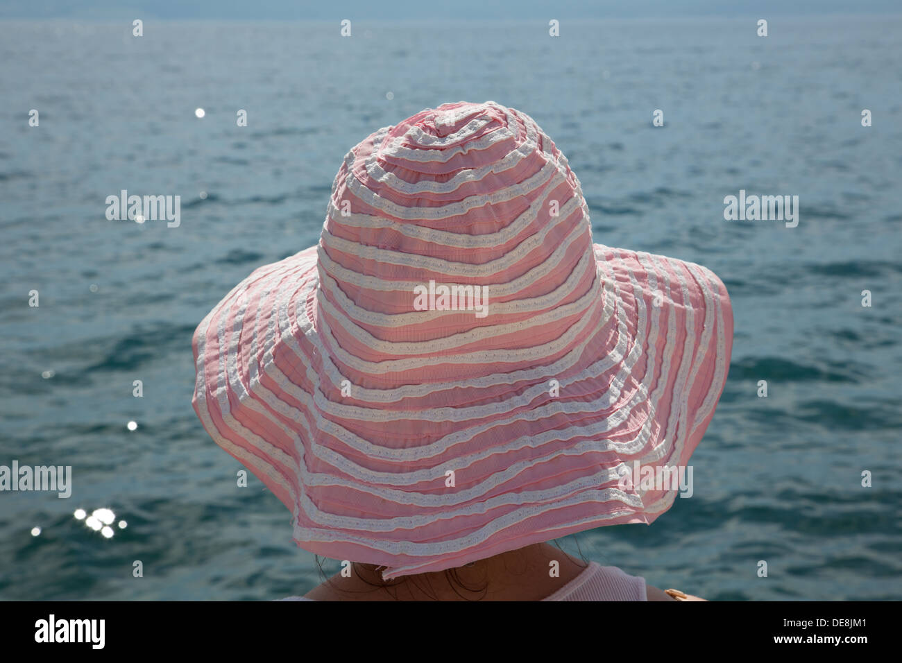 Young woman wearing pink hat hi-res stock photography and images - Alamy