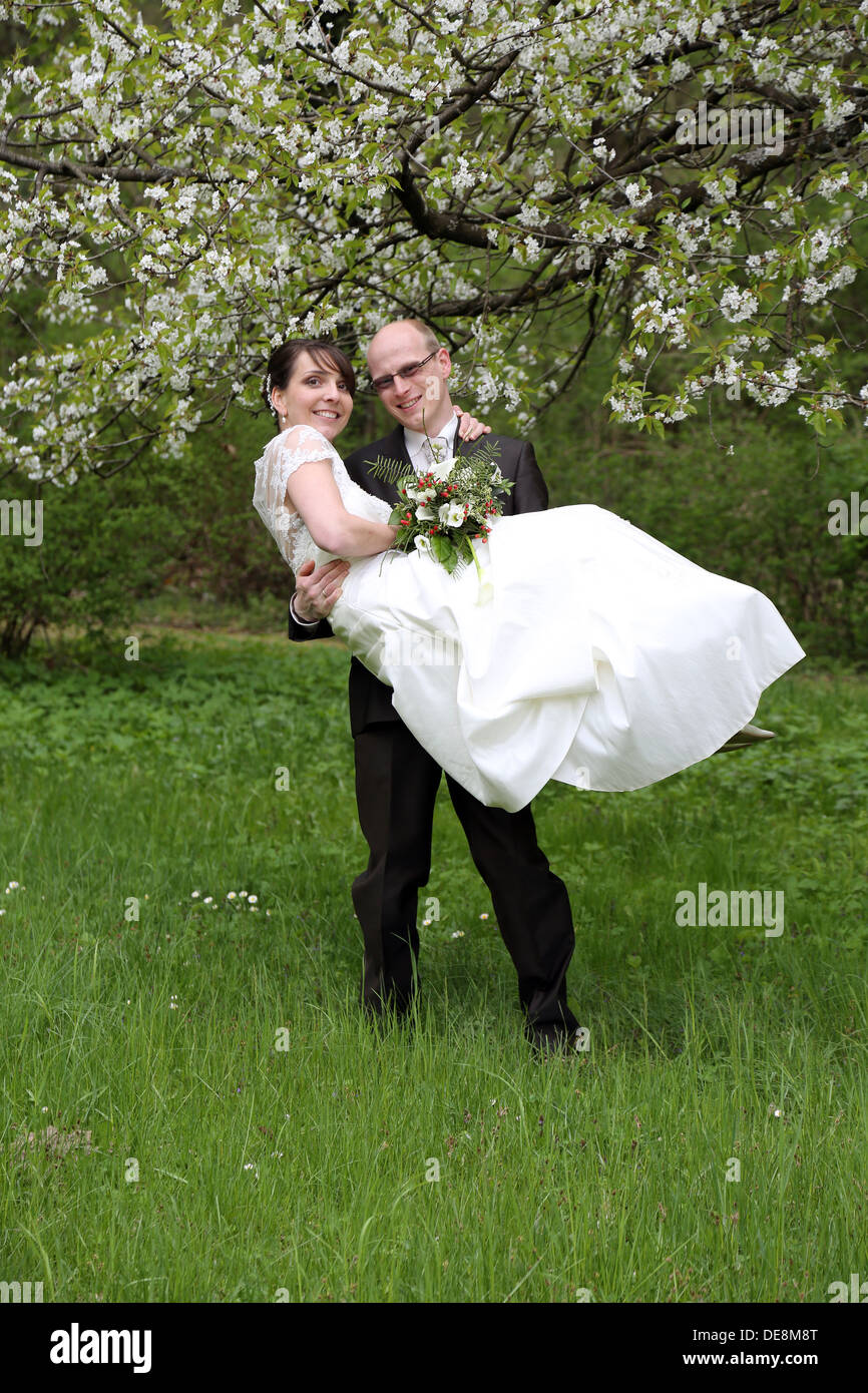 Buckow, Germany, married couple looks happy with the viewer Stock Photo