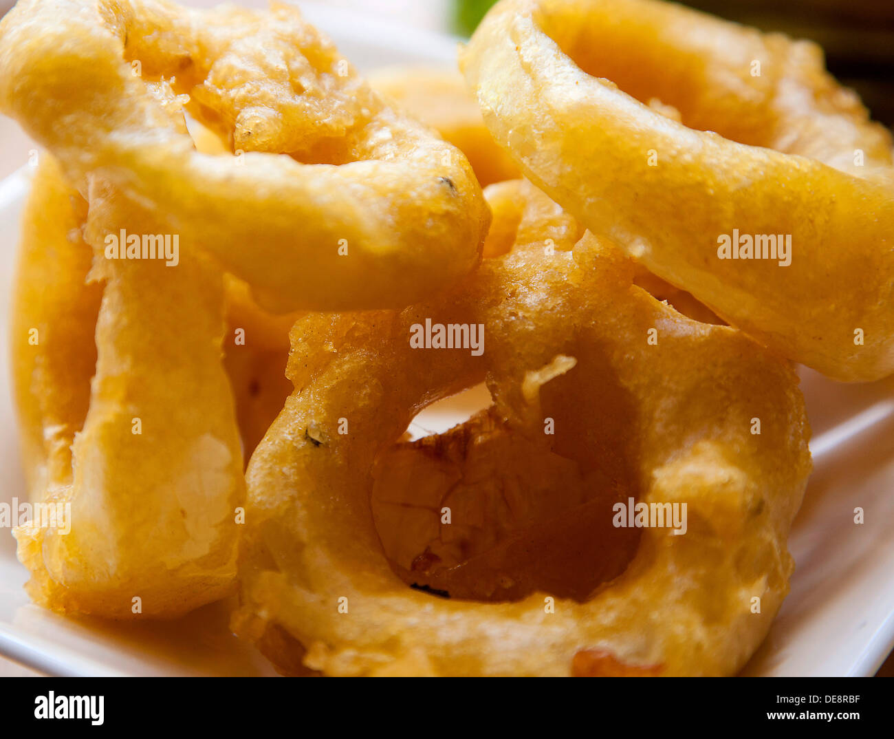 Golden crispy fried onion rings Stock Photo - Alamy