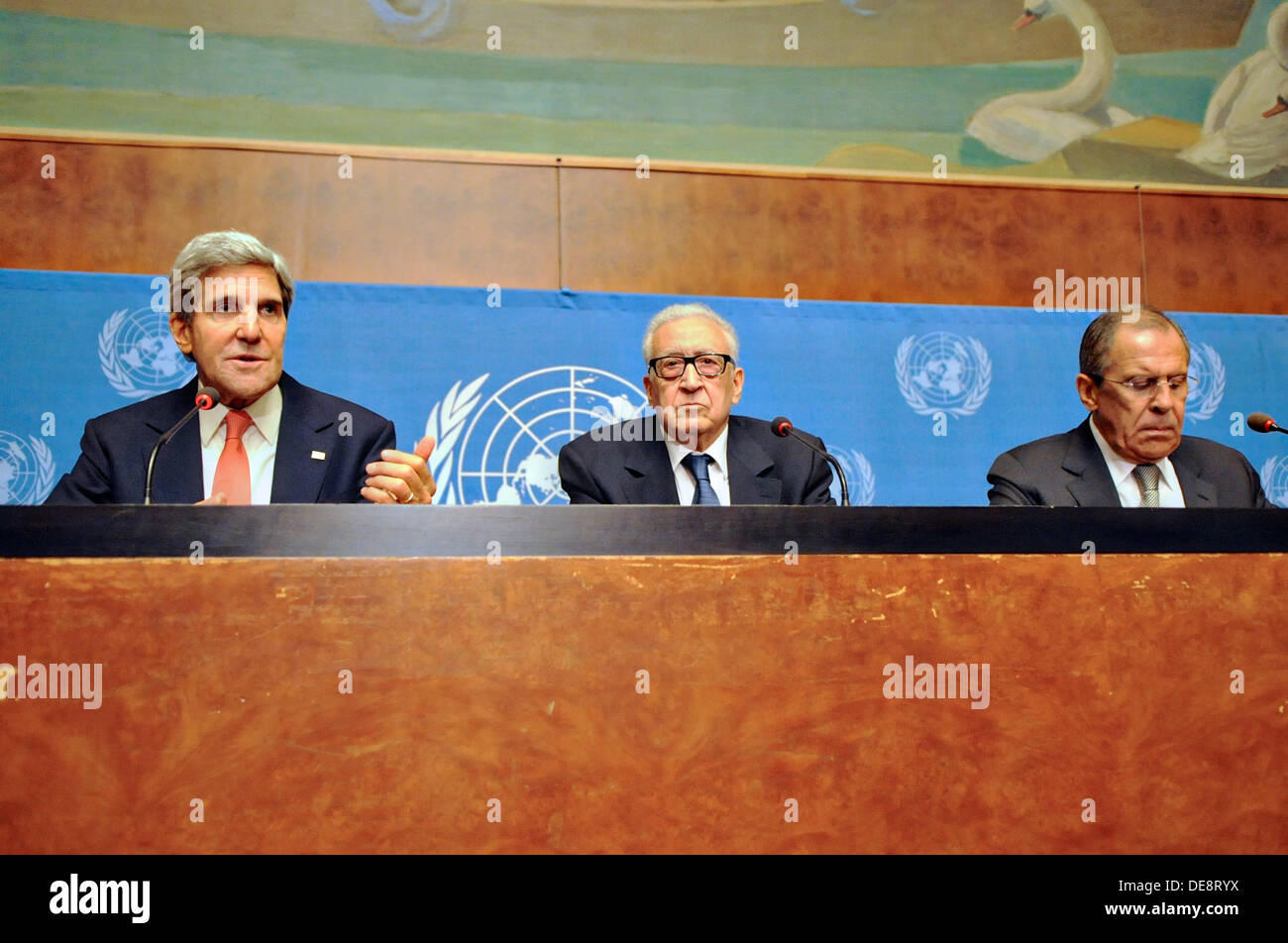 US Secretary of State John Kerry joined by United National Special Envoy for Syria Lakhdar Brahimi and Russian Foreign Minister Sergey Lavrov discusses efforts to reach a political settlement in the Syrian civil war during a news conference at UN headquarters September 13, 2013 in Geneva, Switzerland. Stock Photo