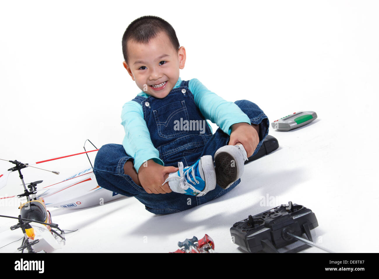 Boy playing toys Stock Photo - Alamy
