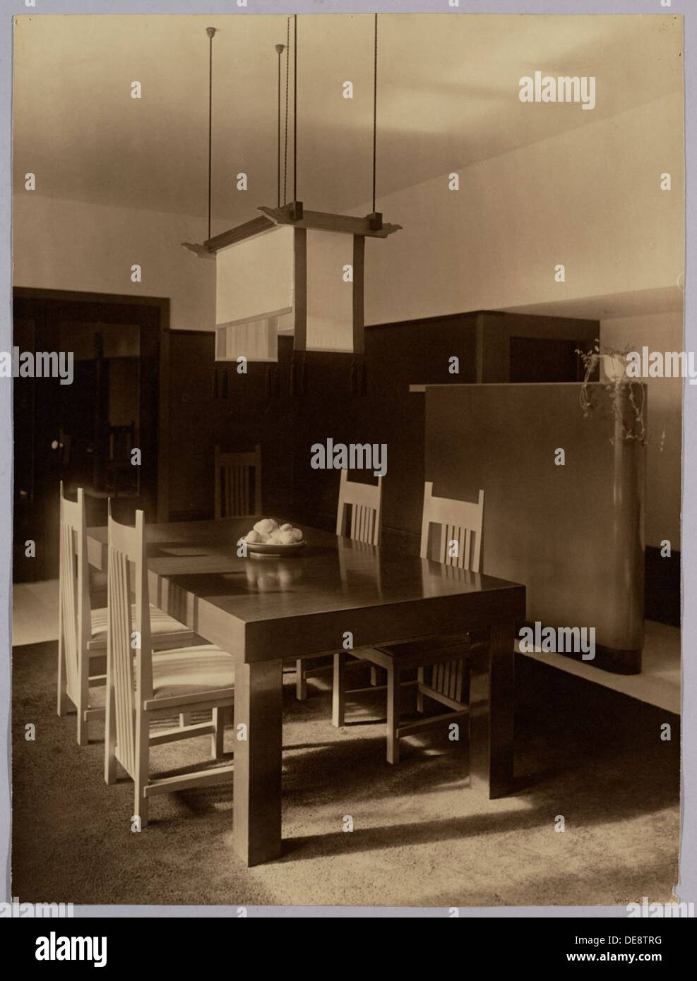 The dining room interior from the 1920s and 1930s represents a ...