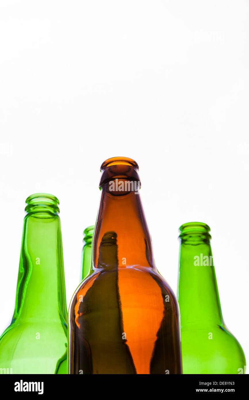 Looking up at empty bottles isolated on a white background Stock Photo
