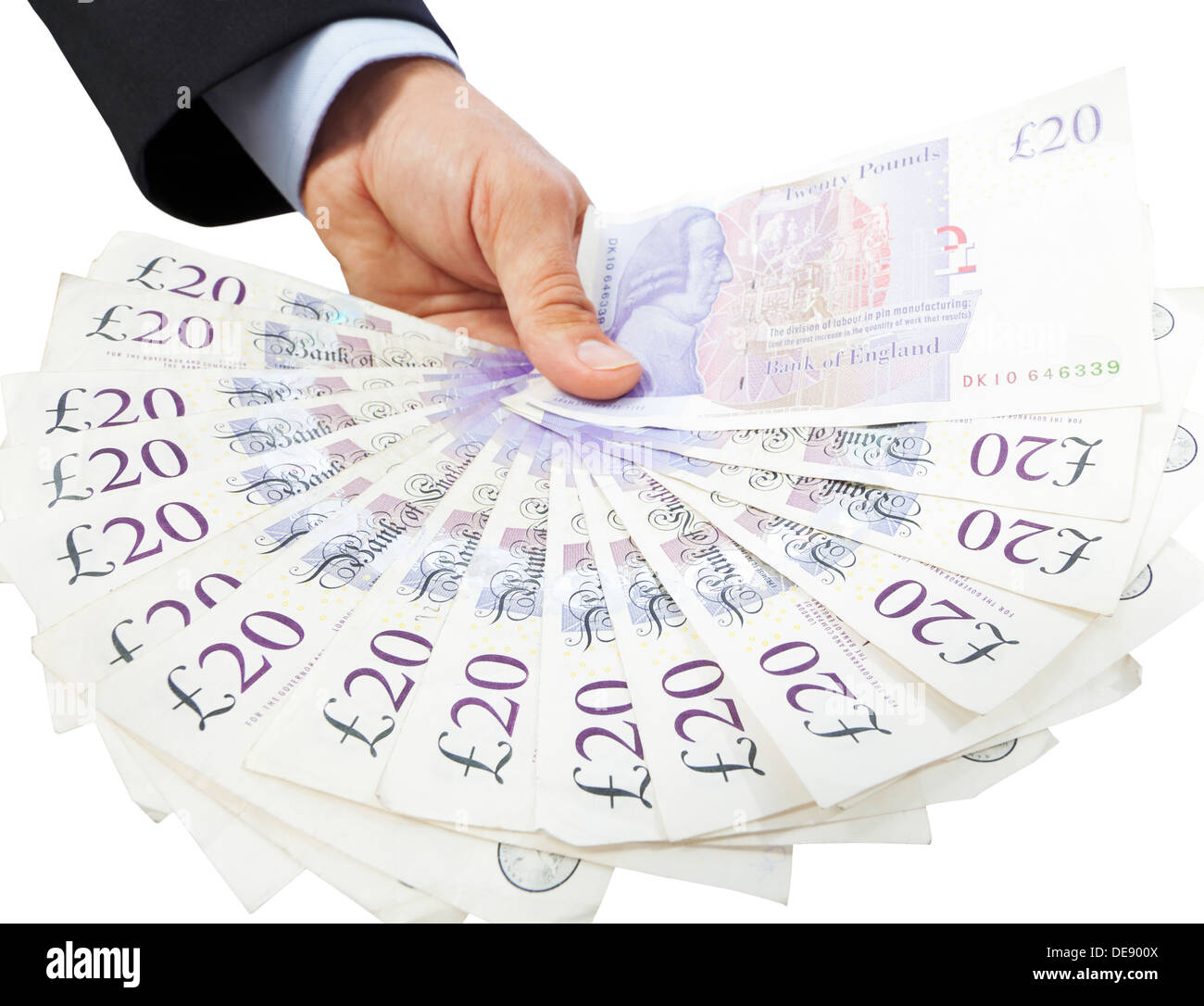 Close-up of a hand holding a fan of twenty pound notes against a white background. Stock Photo