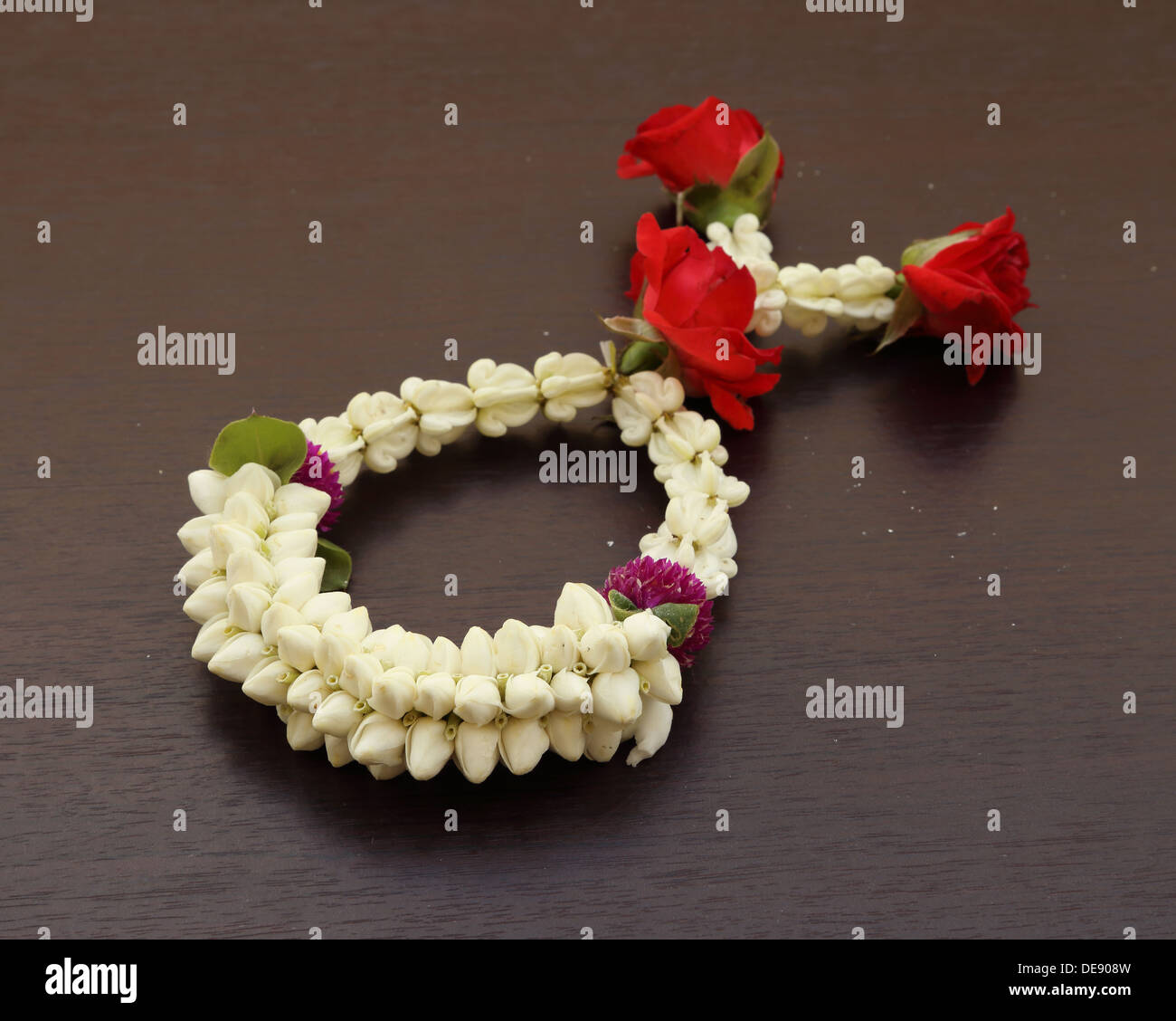 Garland of jasmine flower on wood background Stock Photo Alamy