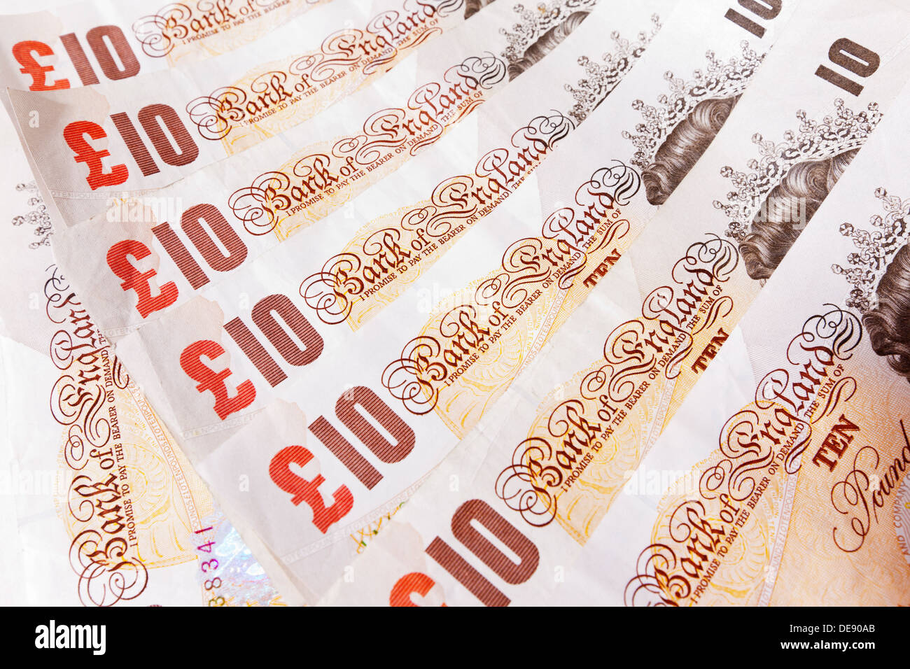 Close-up of a line of ten pound notes. Stock Photo