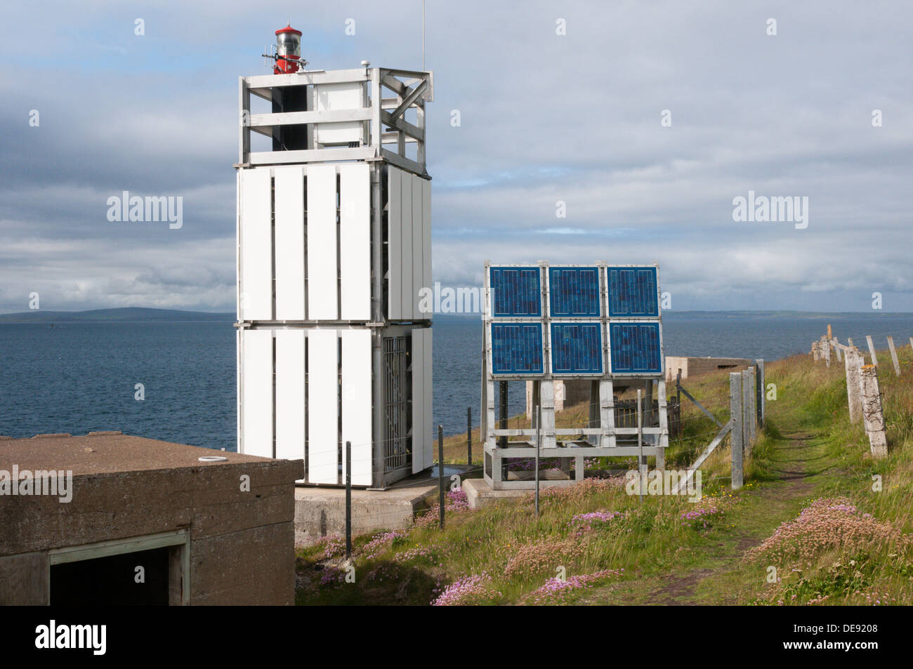 The automatic Hoxa Head Lighthouse on South Ronaldsay,beside Scapa Flow.  Now powered by an array of photo-voltaic cells. Stock Photo