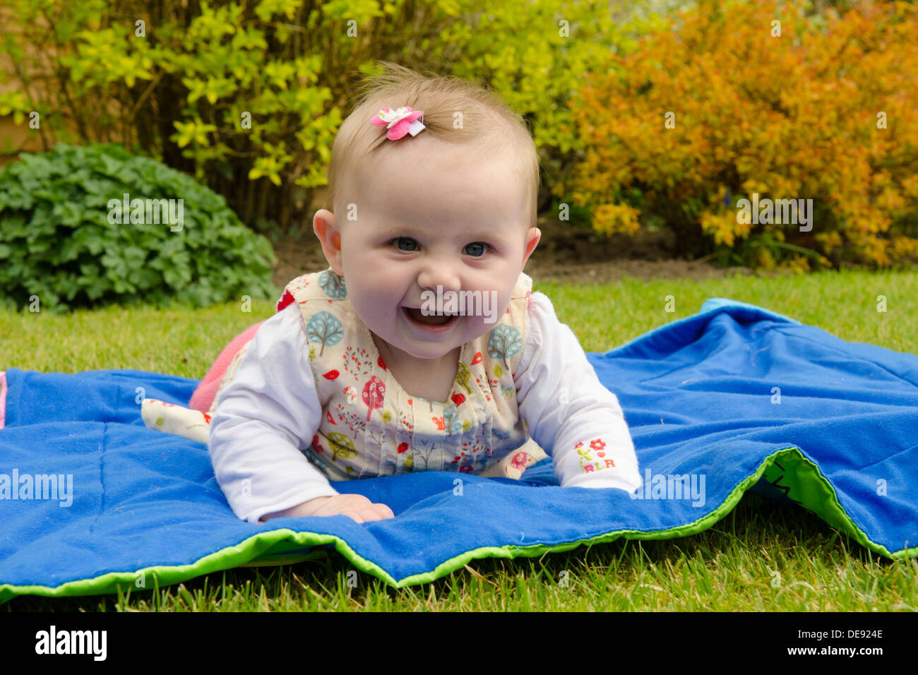 Baby girl on blanket hi-res stock photography and images - Alamy
