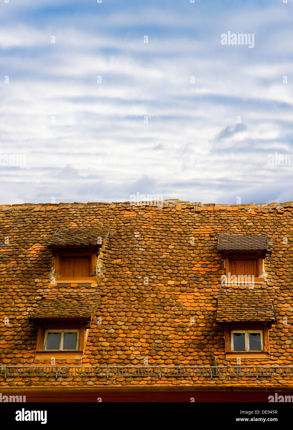 Tiled Roof with Four Dormer Windows Stock Photo