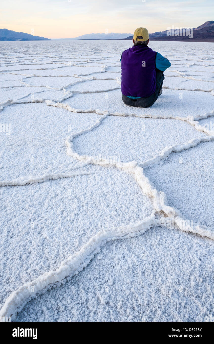 Man sitting on badwater salt flats hi-res stock photography and images ...
