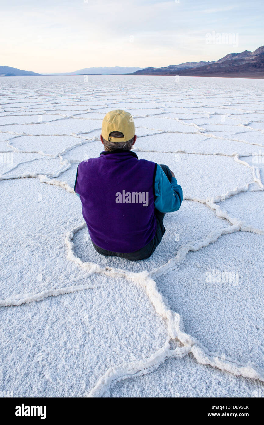 Man sitting on badwater salt flats hi-res stock photography and images ...