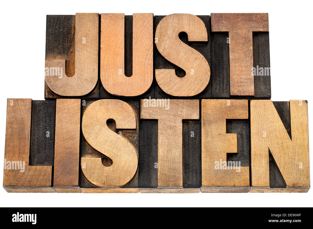 just listen advice - isolated text in letterpress wood type blocks Stock Photo