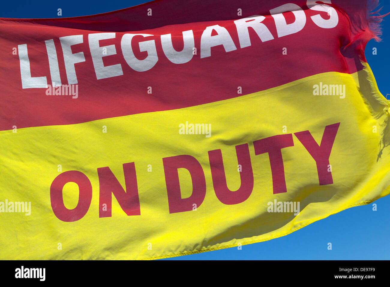 Lifeguards on duty flag at Muizenberg Beach, South Africa. Stock Photo