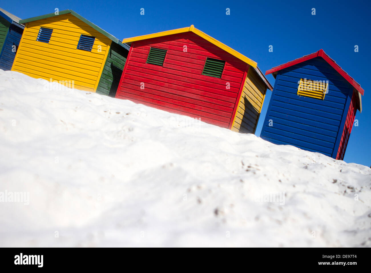 Brightly painted beach huts. Stock Photo