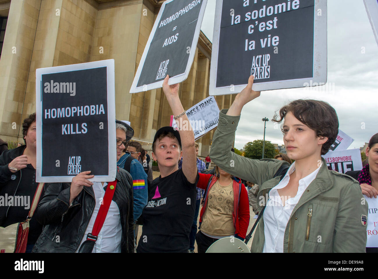 Paris, France. Several LGBT Groups (Act Up-Paris) held an Anti-Homophobia Law, in Russia, Demonstration, (Cecile and Liliane) French Activist protest poster, violence against gay men, lgbtq protesters women with signs Stock Photo