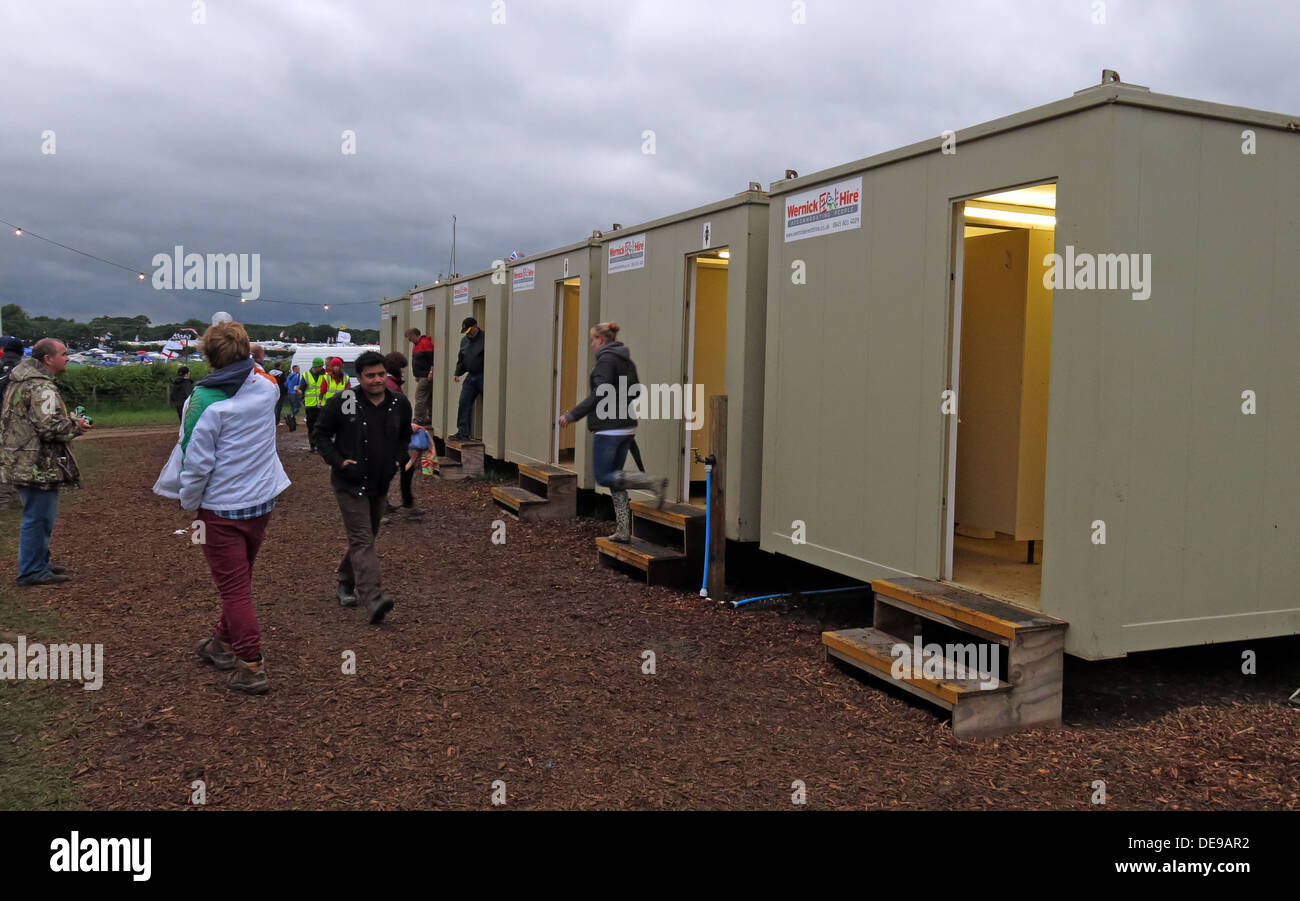 Festival and event toilet facilities, portable WC hire in evening Stock Photo