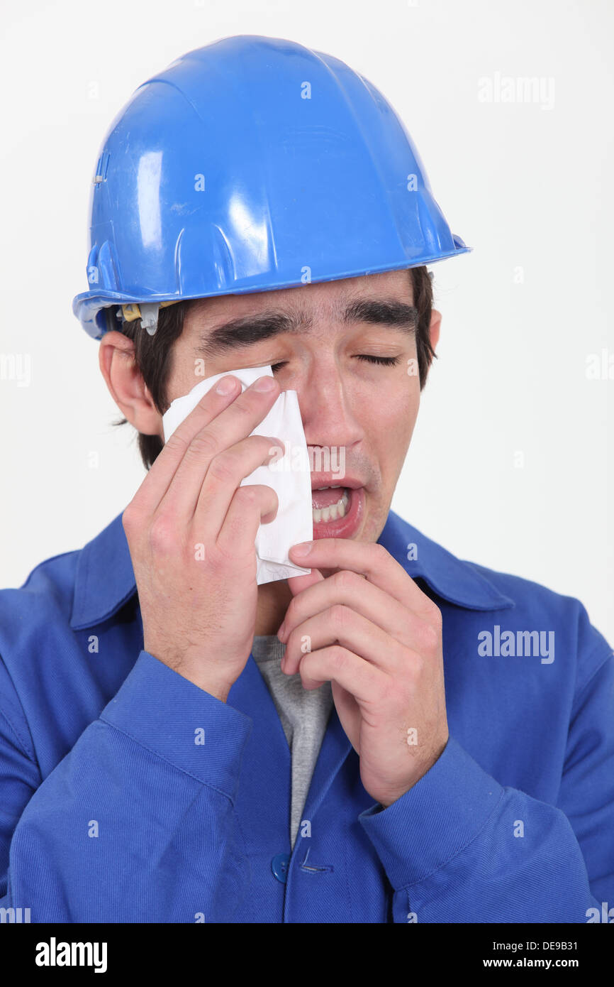 Construction worker crying Stock Photo