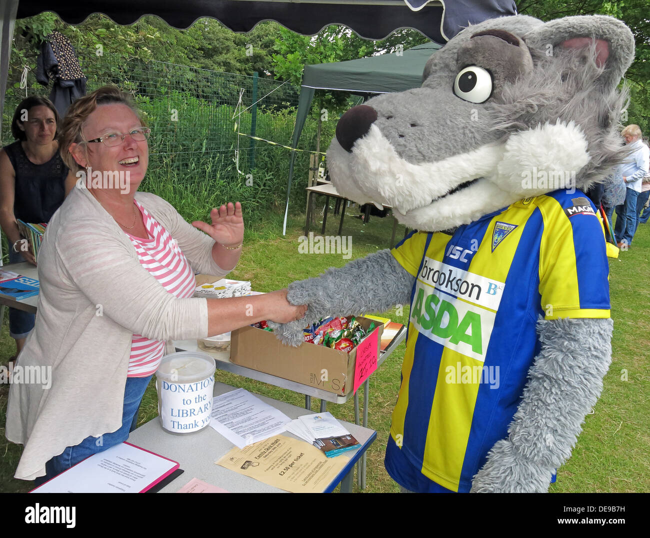 Warrington Wolves Mascot Wolfie at Grappenhall Walking Day, Community Library stall, Warrington, Cheshire,England,UK Stock Photo