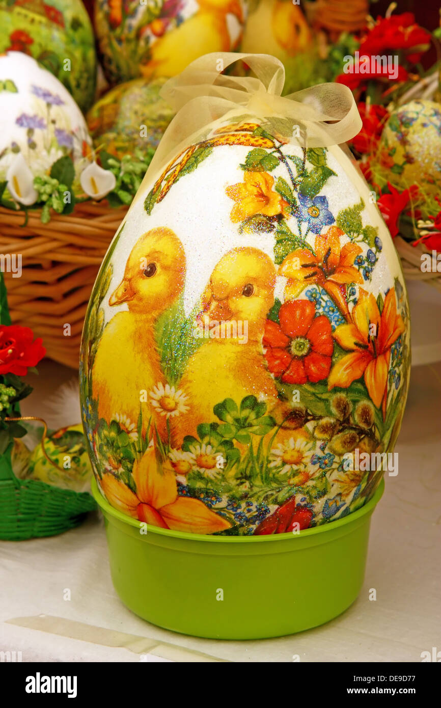 Easter egg, chicken egg with decoration in decoupage technique Stock