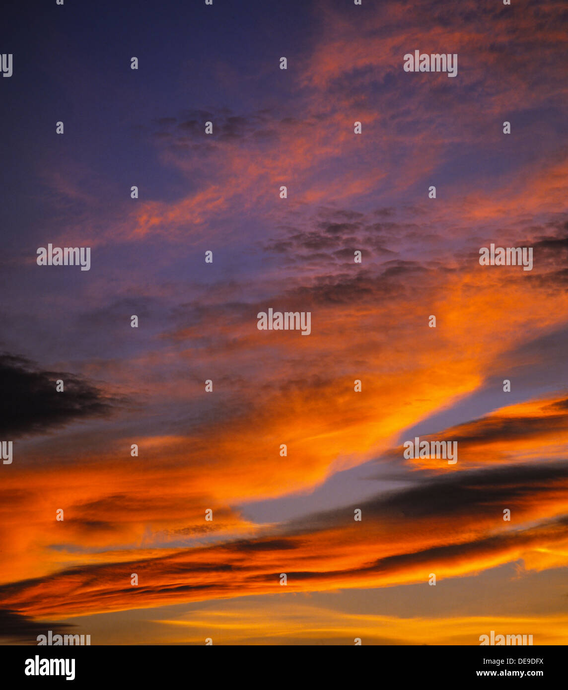 Sunset, clouds in the evening sky Stock Photo - Alamy