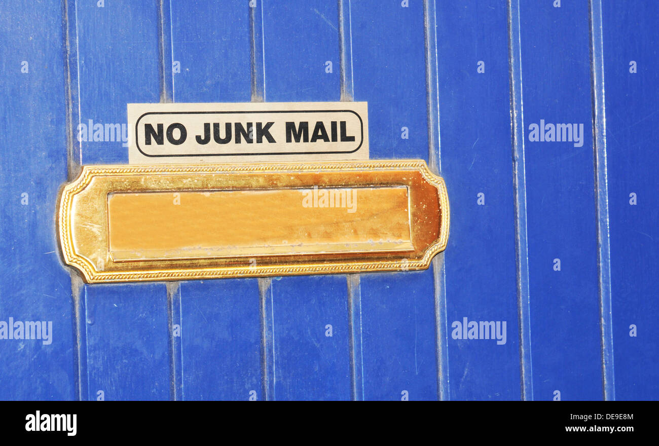 'No junk mail' sign on blue door Stock Photo Alamy