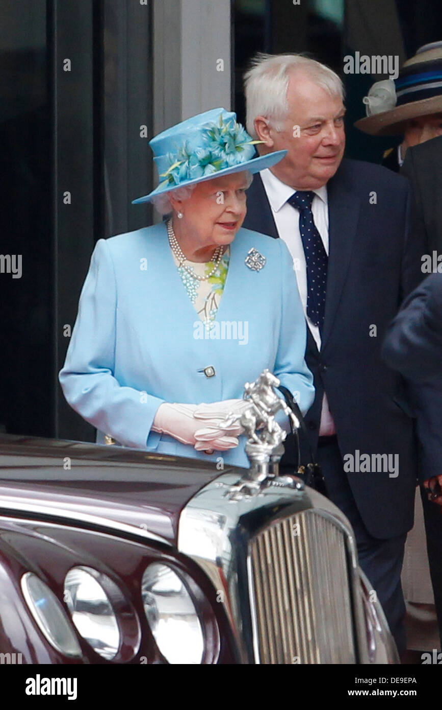 Britain's Queen Elizabeth II accompany by The Chairman of the BBC Trust, Lord Patten (R) departs the new BBC Broadcasting House Stock Photo