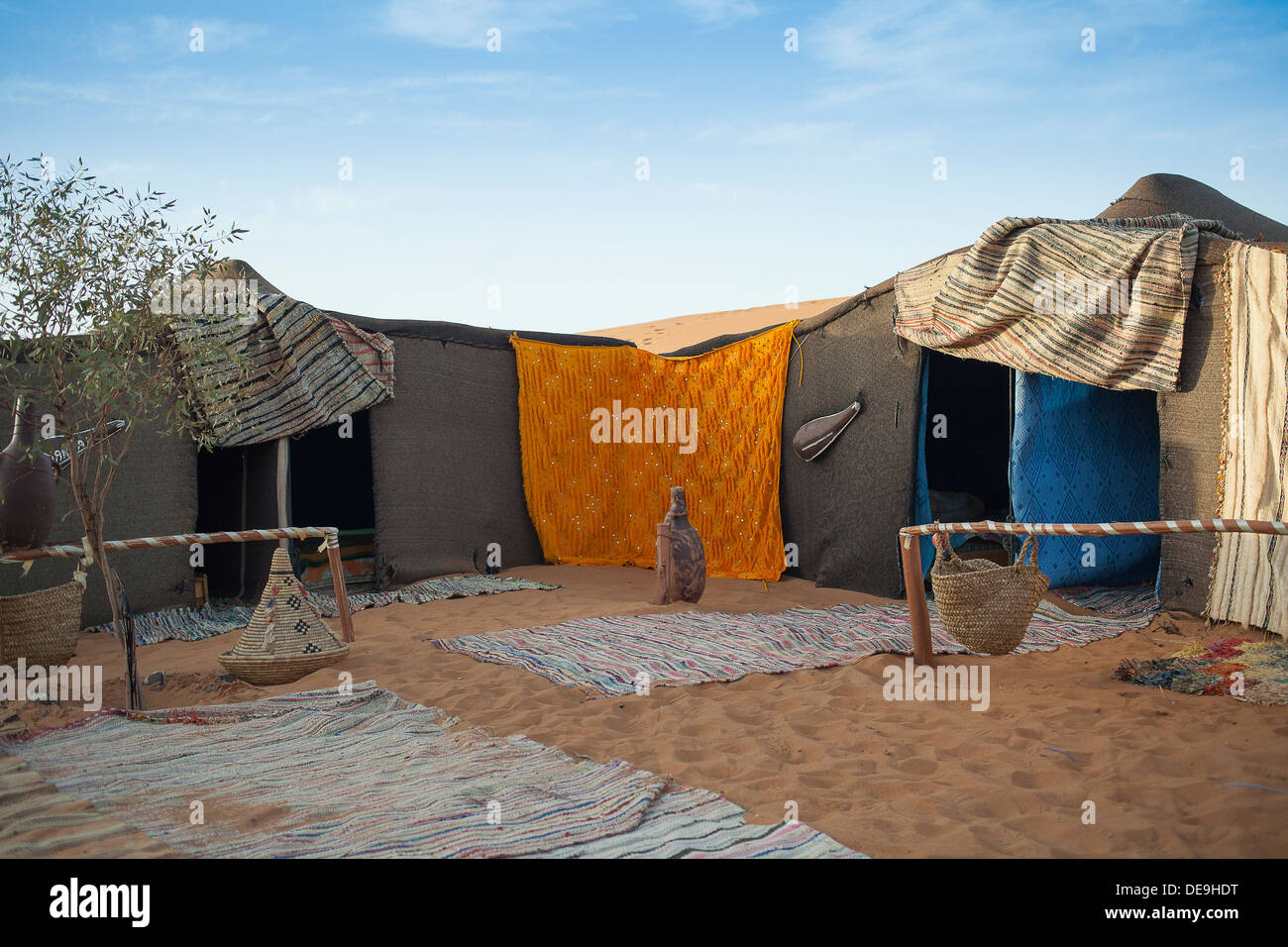 berber tent camp in the moroccan sahara at sunset stock photo