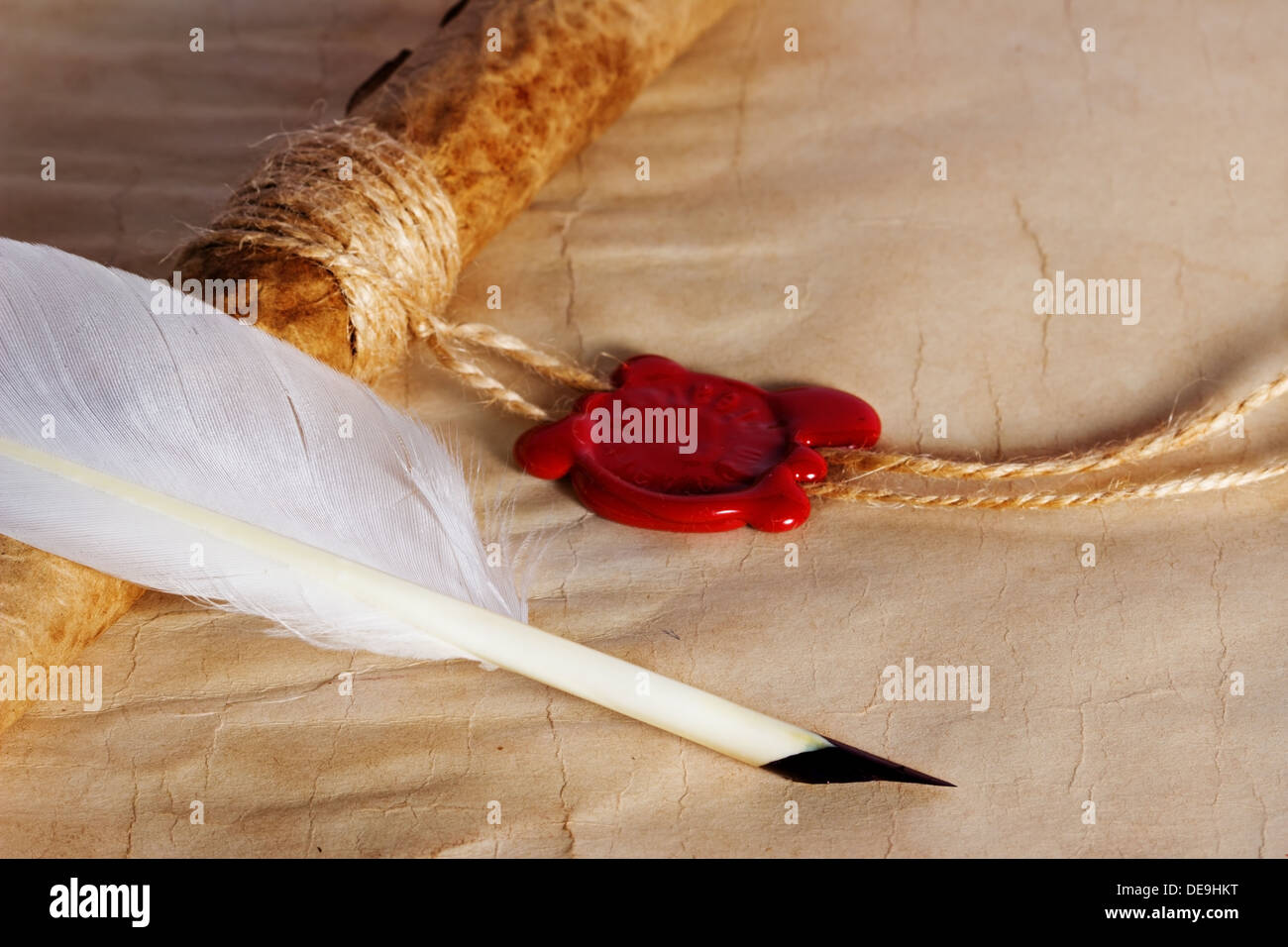 old paper, ancient parchment scroll with wax seal and quill pen Stock