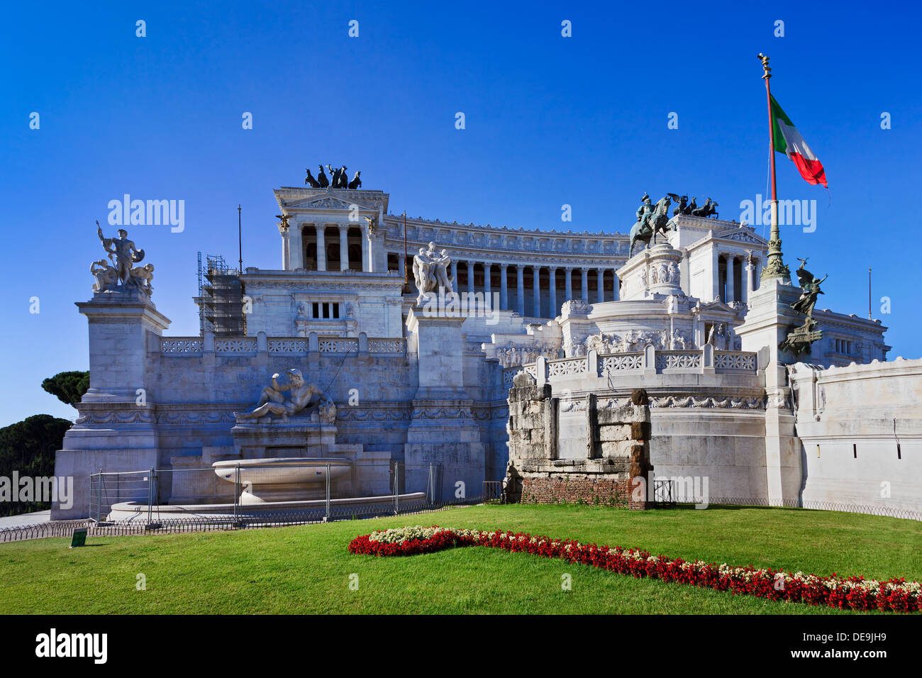 Italy Rome capital of italian nation altar of fatherland landmark monument day time blue sky marble palace with colonnade and st Stock Photo