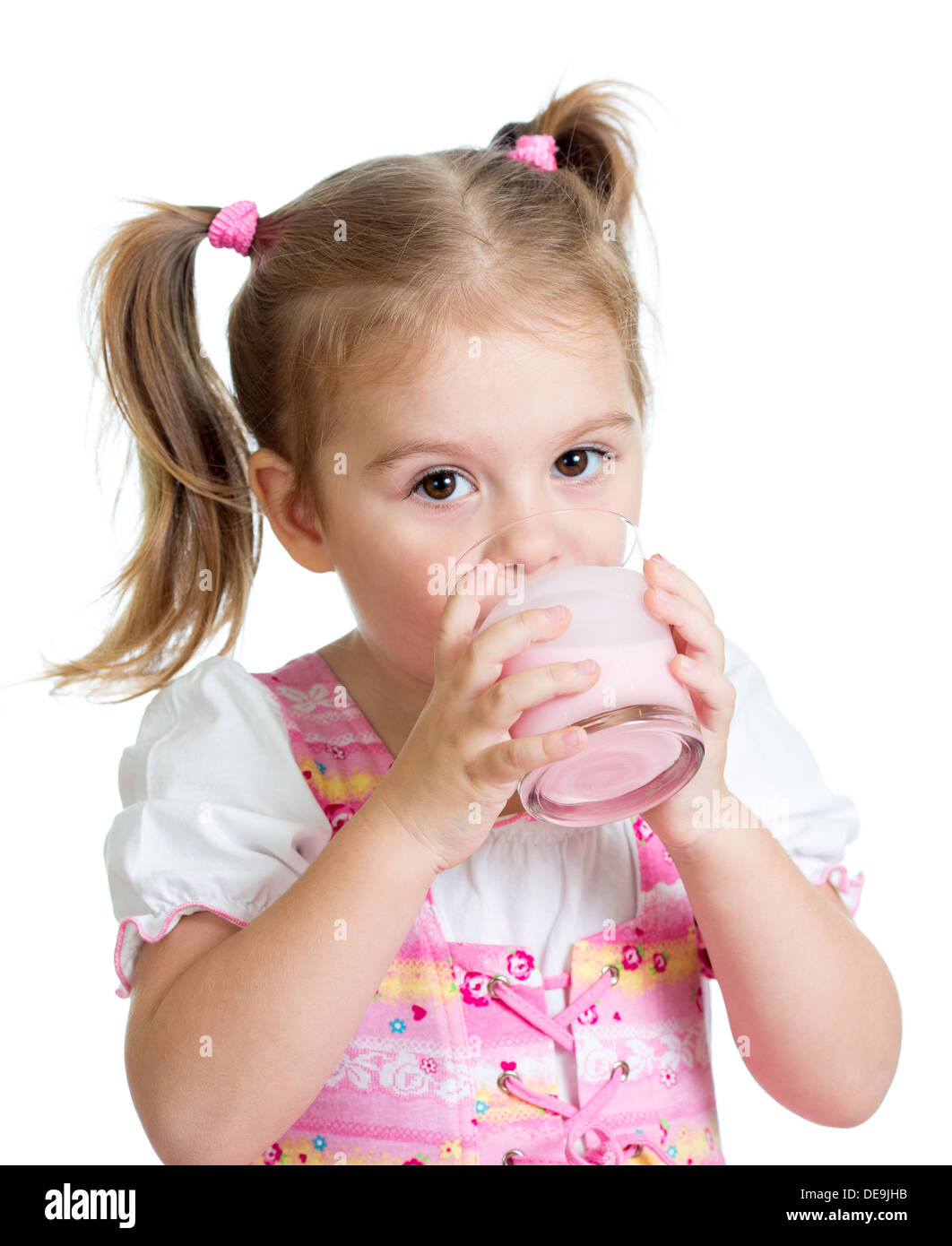 Kid drinking yoghurt from glass Stock Photo Alamy