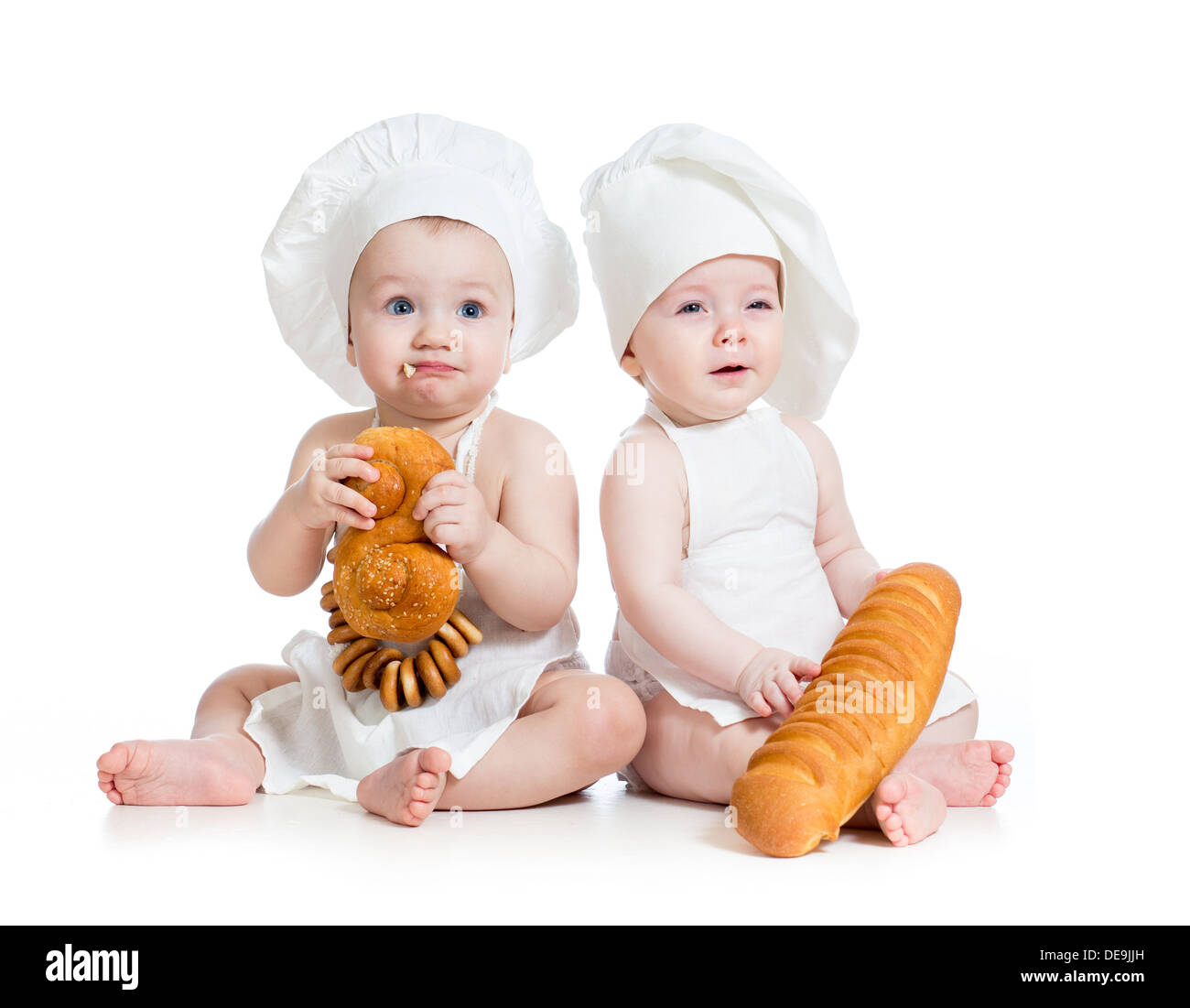 funny bakers babies boy and girl Stock Photo