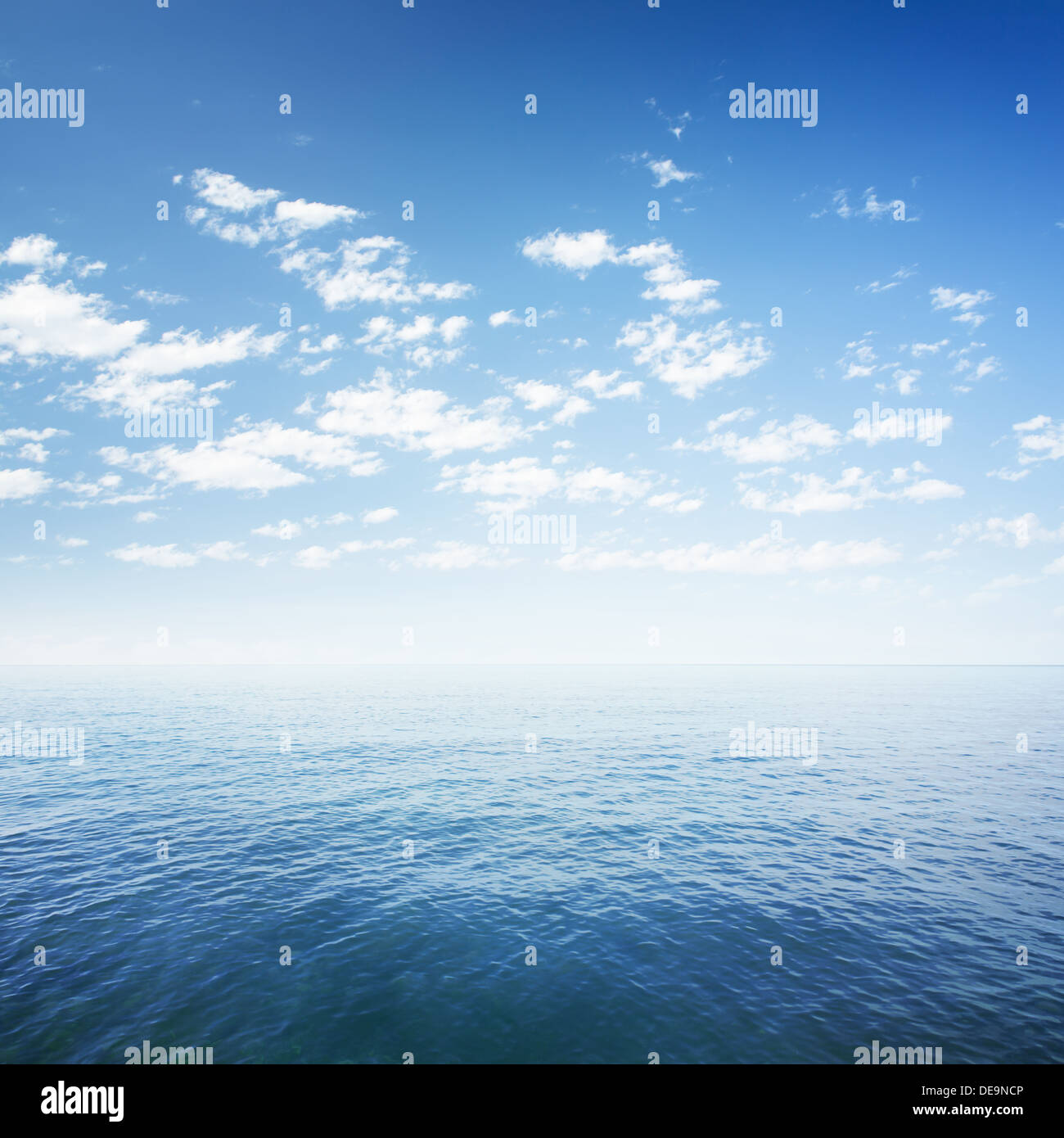 blue sky over sea or ocean water surface Stock Photo