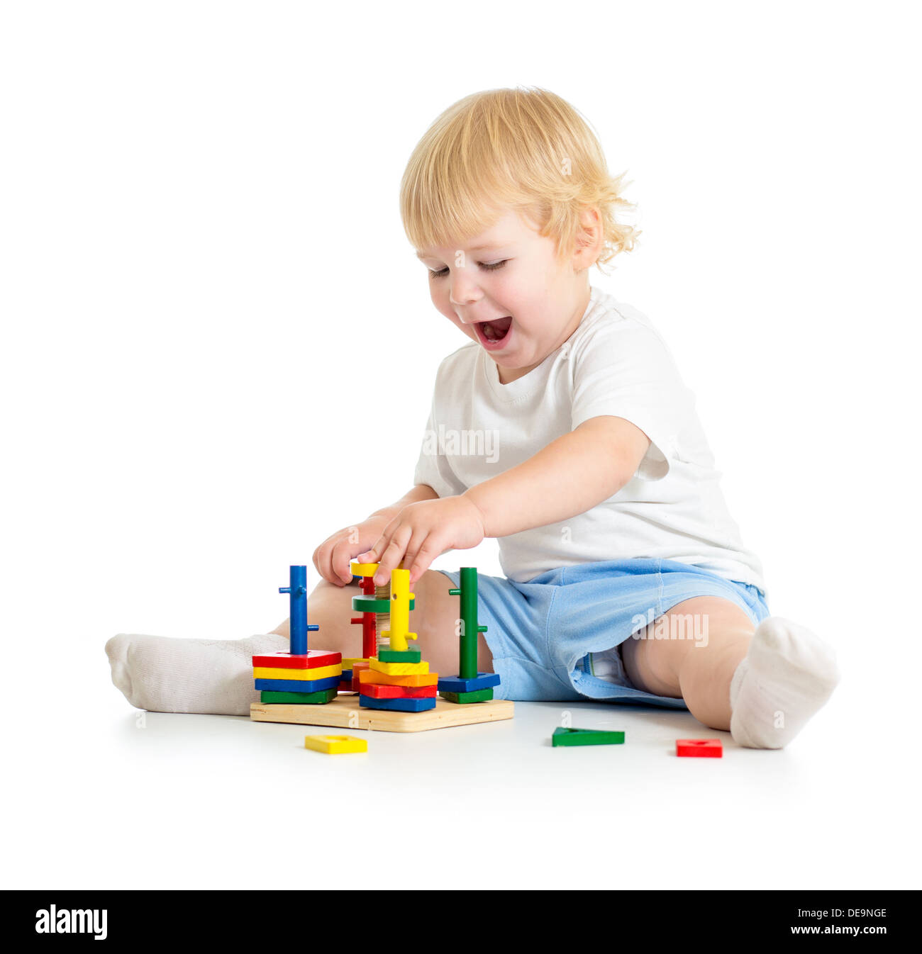 Kid playing logical education toys with great interest Stock Photo
