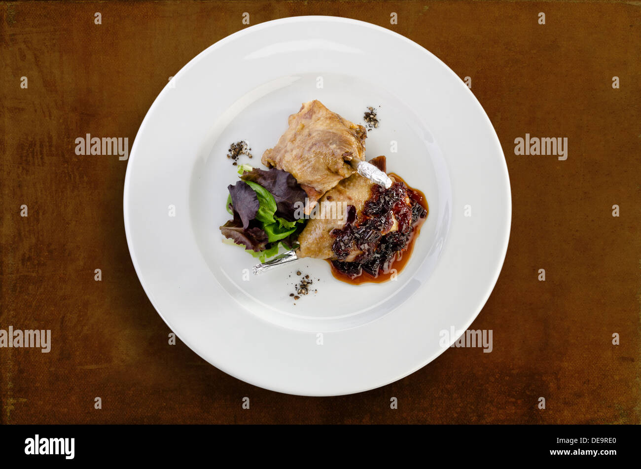 Roast duck legs - isolated Stock Photo - Alamy