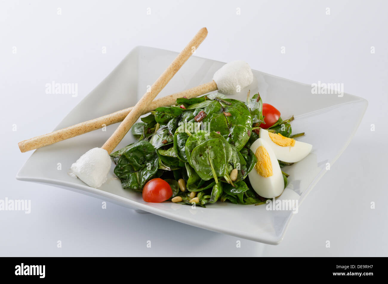 Spinach & goat cheese salad Stock Photo Alamy