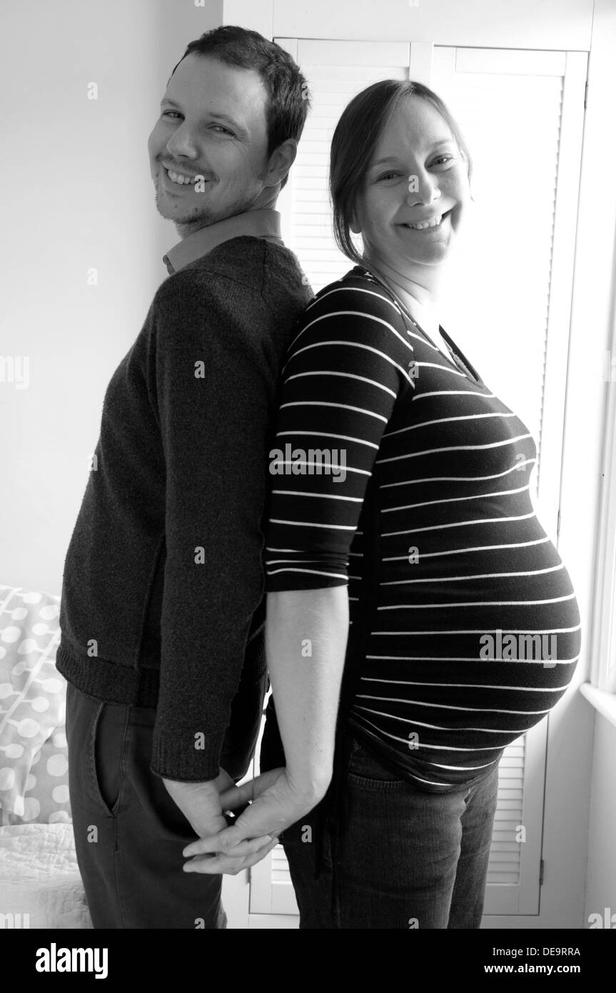 Profile shot pregnant wife husband hi-res stock photography and images ...