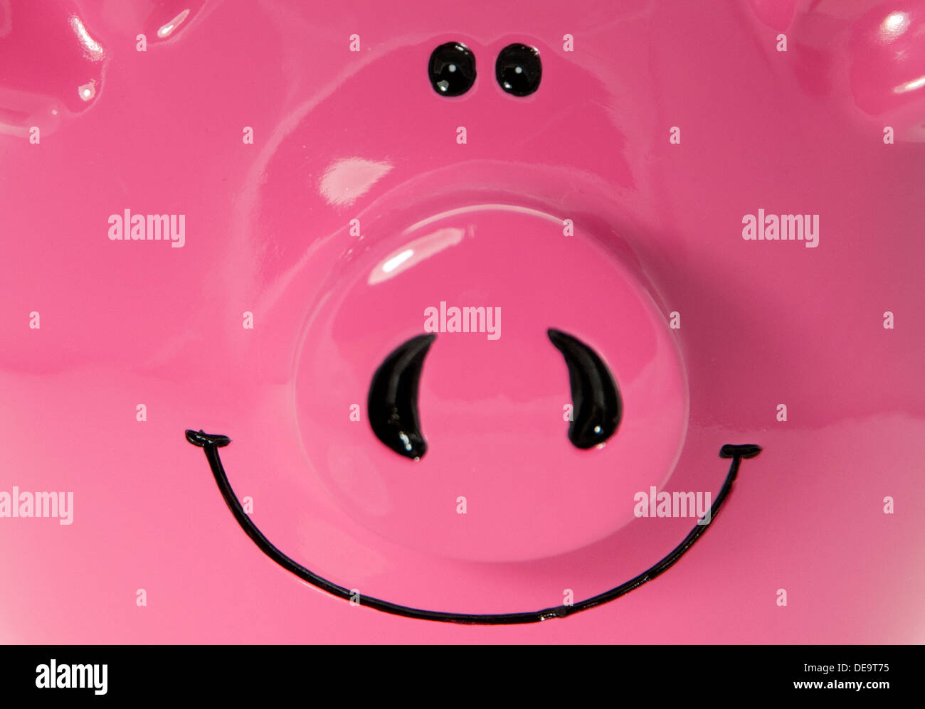 Close up of Smiling Pink Piggy Bank Stock Photo