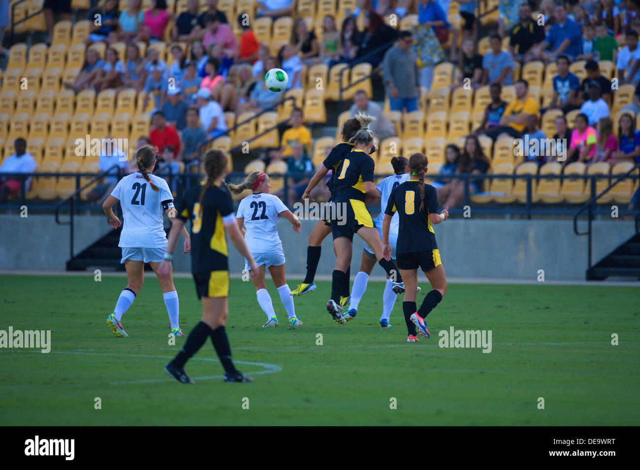 Kennesaw, Georgia.  USA.   September 13, 2013.   Players battle for the ball during Ole Miss' 2-1 win over Kennesaw State at Fifth Third Bank Stadium.  Women's NCAA Division I Soccer. Stock Photo