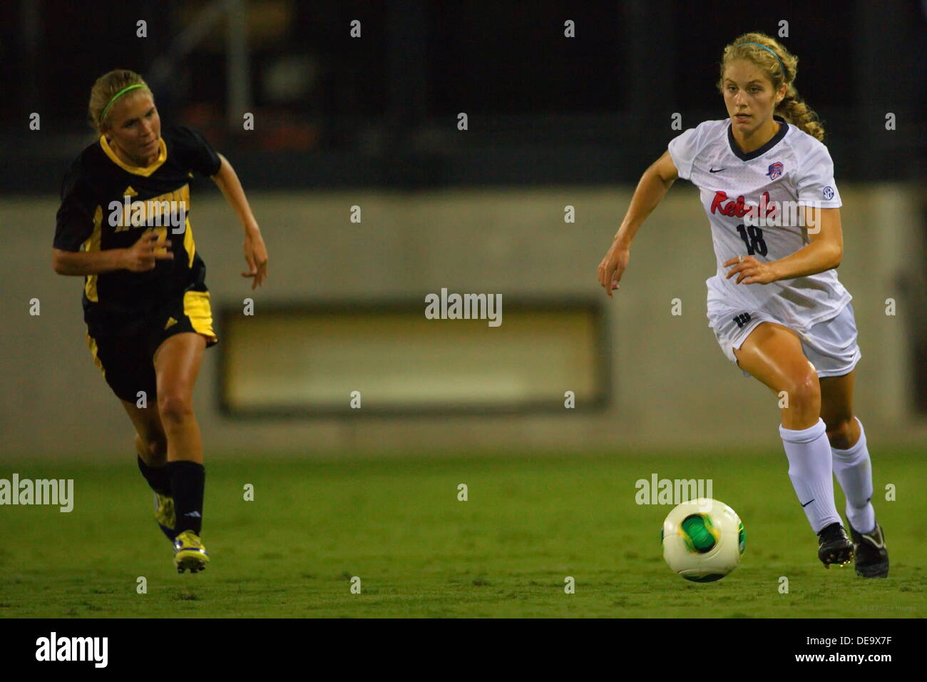 Kennesaw, Georgia.  USA.   September 13, 2013.   Melissa Capocaccia (18) dribbles the ball upfield during Ole Miss' 2-1 win over Kennesaw State at Fifth Third Bank Stadium.  Women's NCAA Division I Soccer. Stock Photo