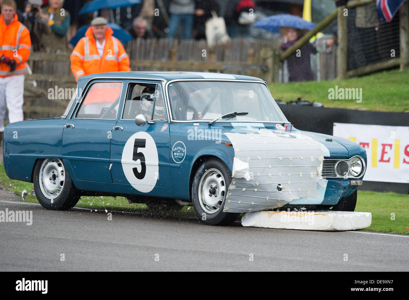 Chichester, West Sussex, UK. 13th Sep, 2013. Goodwood Revival. Goodwood Racing Circuit, West Sussex - Friday 13th September. A car smashes into the polystyrene chicane during a qualifying session. © MeonStock/Alamy Live News Stock Photo