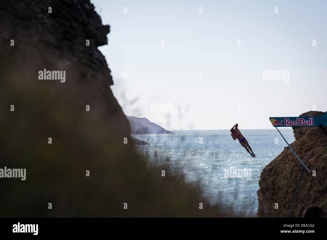 Pembrokeshire, West Wales, UK. 14th Sep, 2013. Divers compete in round 5 of the Red Bull Cliff Diving competition at Blue Lagoon in Pembrokeshire, West Wales. Credit:  John Wellings/Alamy Live News Stock Photo