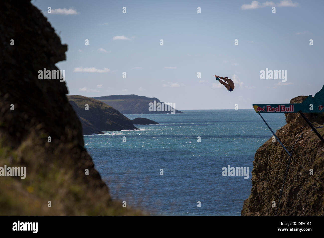 Pembrokeshire, West Wales, UK. 14th Sep, 2013. Divers compete in round 5 of the Red Bull Cliff Diving competition at Blue Lagoon in Pembrokeshire, West Wales. Credit:  John Wellings/Alamy Live News Stock Photo