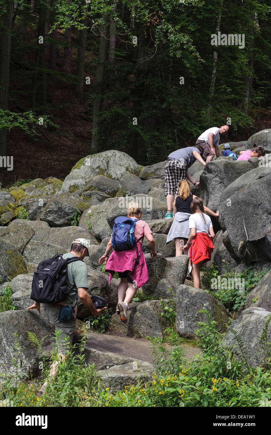 Visitors at  Felsenmeer (Sea of rocks) near Lautertal-Reichenbach in Forest of Odes, Hesse, Germany Stock Photo