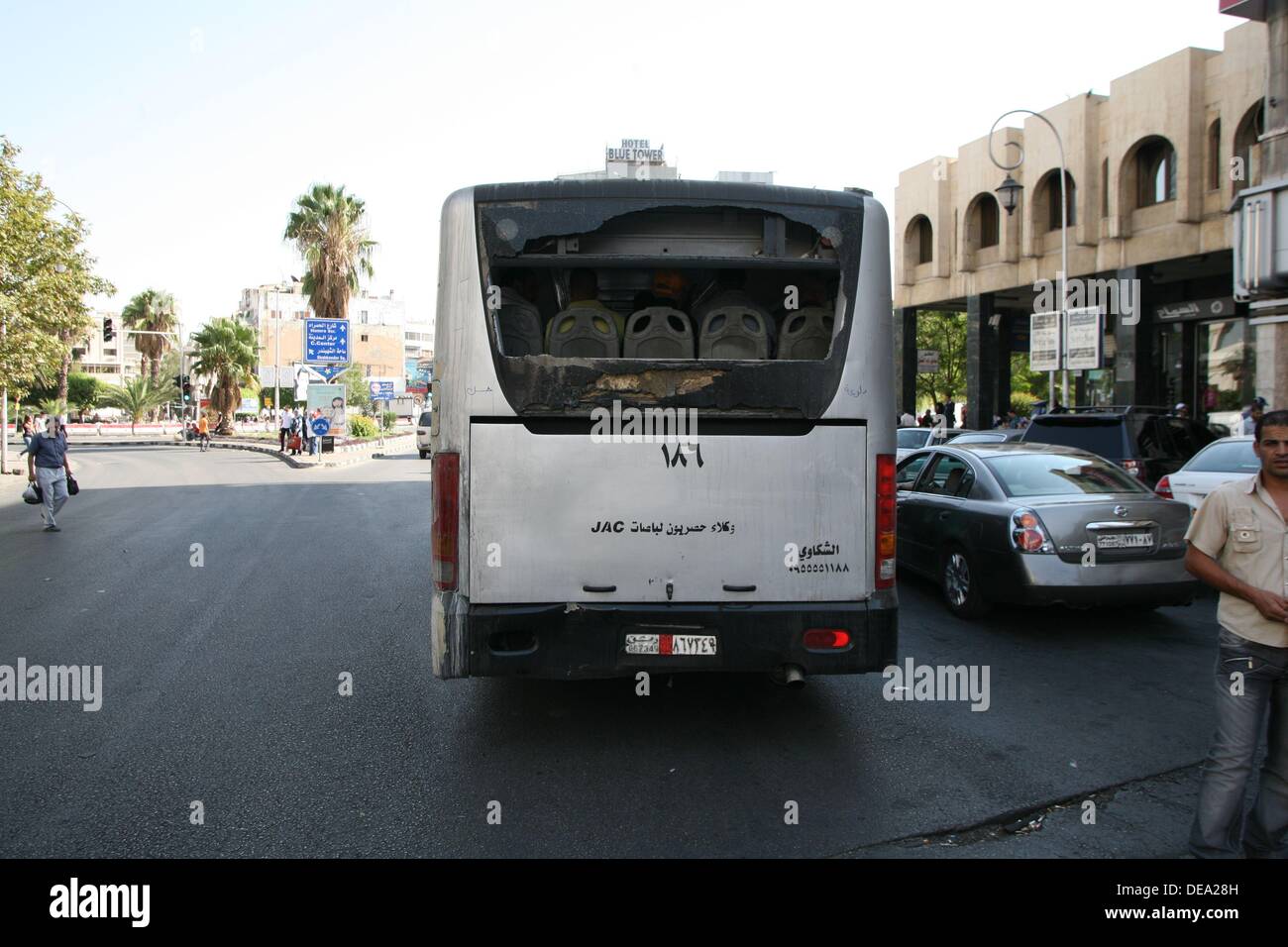 broken public bus still operates in the streets of Damascus, Syria, on 2013-09-14. Stock Photo