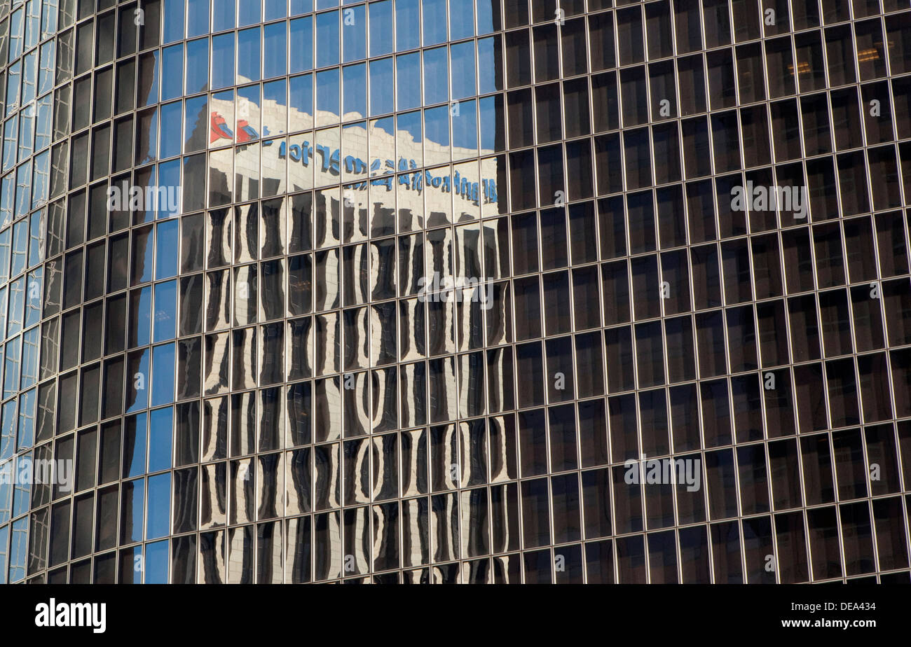 A reflection of the Bank of America building is seen in downtown Los Angeles, California Stock Photo